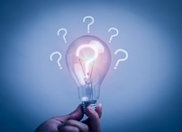 concept of problem analysis, creativity analytical thinking process Or find out the cause that happened during the process, hand holding light bulb with the question mark inside.
